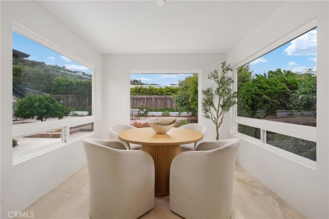 32512 Seven Seas Dr, Dana Point, CA 92629 - sunroom featuring healthy amount of natural light and marble finish flooring