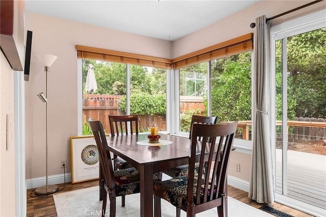 11 Tilden Ln, Chico, CA 95928 - dining space featuring healthy amount of natural light and wood finished floors