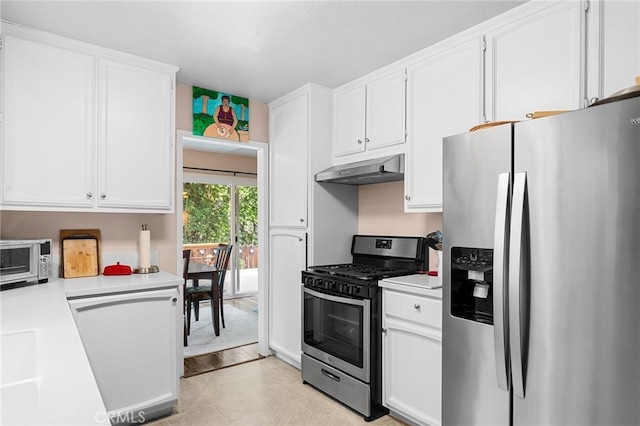 11 Tilden Ln, Chico, CA 95928 - kitchen with appliances with stainless steel finishes, under cabinet range hood, light countertops, and white cabinetry