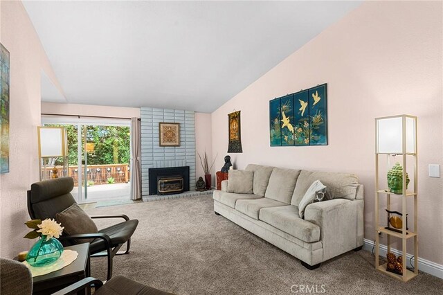 11 Tilden Ln, Chico, CA 95928 - living room with carpet floors, lofted ceiling, and a fireplace