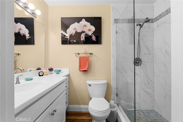 11 Tilden Ln, Chico, CA 95928 - full bath featuring a marble finish shower, vanity, and wood finished floors