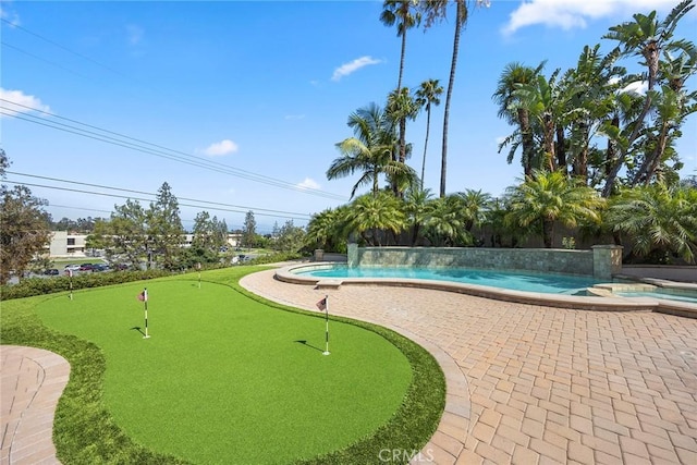 1016 N Highland Ave, Fullerton, CA 92835 - view of pool featuring a putting area, a patio, and a pool with connected hot tub