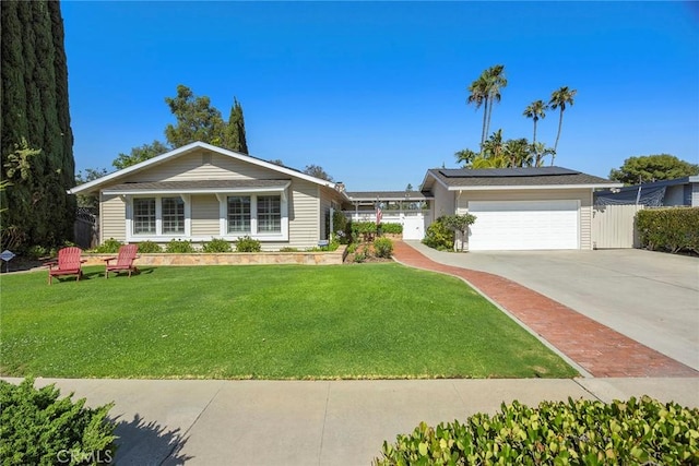 1016 N Highland Ave, Fullerton, CA 92835 - ranch-style home with driveway, roof mounted solar panels, and an attached garage