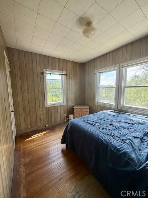 4544 Tulip Ave, Oakland, CA 94619 - bedroom with wood finished floors and wooden walls