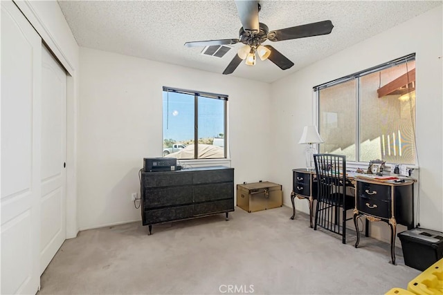 6333 Carodean Rd Unit 29, Palms, CA 92277 - home office featuring a ceiling fan, carpet flooring, and a textured ceiling