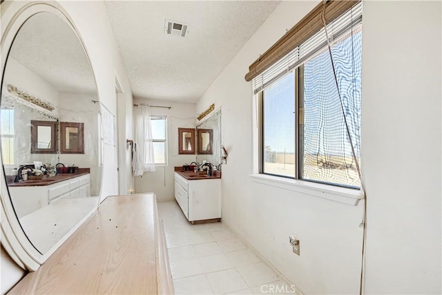 6333 Carodean Rd Unit 29, Palms, CA 92277 - hall with a textured ceiling
