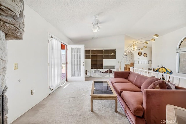 6333 Carodean Rd Unit 29, Palms, CA 92277 - living area with carpet flooring, ceiling fan, a textured ceiling, and lofted ceiling