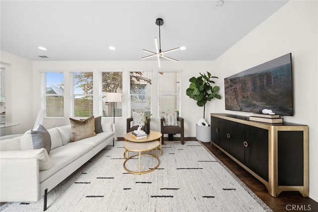 135 Acamar, Irvine, CA 92618 - living room featuring wood finished floors, recessed lighting, and a chandelier