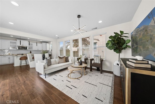 135 Acamar, Irvine, CA 92618 - living room featuring dark wood finished floors and recessed lighting