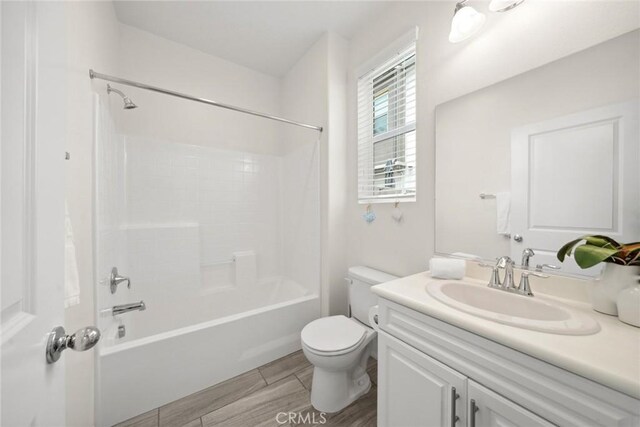 135 Acamar, Irvine, CA 92618 - bathroom featuring vanity, bathing tub / shower combination, and wood finished floors