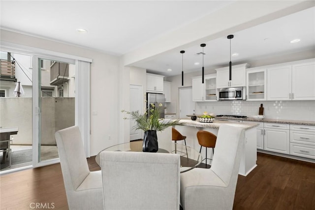 135 Acamar, Irvine, CA 92618 - dining space featuring dark wood-style flooring and recessed lighting