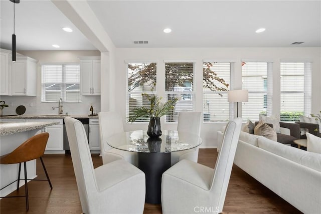 135 Acamar, Irvine, CA 92618 - dining space featuring dark wood-style flooring and recessed lighting