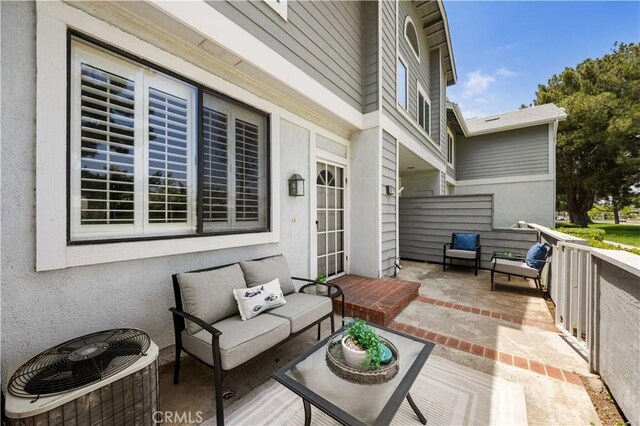 67 Remington Unit 231, Irvine, CA 92620 - view of patio with an outdoor living space