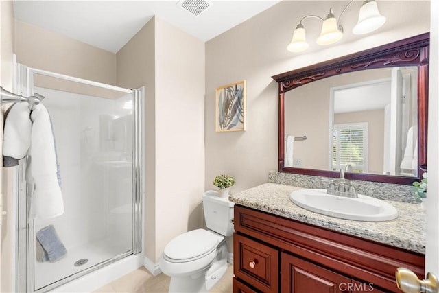 67 Remington Unit 231, Irvine, CA 92620 - bathroom featuring a shower stall, vanity, and tile patterned floors
