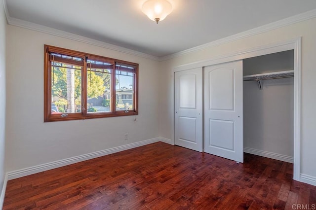 4280 Trias St, San Diego, CA 92103 - unfurnished bedroom featuring dark wood-style flooring, a closet, and ornamental molding