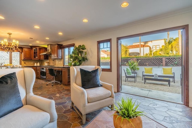 4280 Trias St, San Diego, CA 92103 - living area featuring dark stone finish flooring, recessed lighting, ornamental molding, and a chandelier