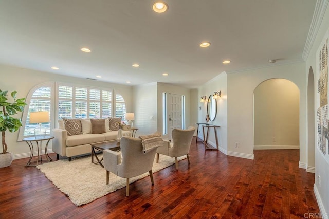 4280 Trias St, San Diego, CA 92103 - living area with arched walkways, crown molding, dark wood finished floors, and recessed lighting
