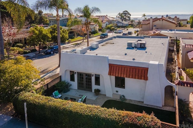 4280 Trias St, San Diego, CA 92103 - rear view of property featuring stucco siding, a residential view, and french doors