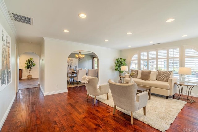 4280 Trias St, San Diego, CA 92103 - living room with arched walkways, plenty of natural light, dark wood finished floors, ornamental molding, and a chandelier