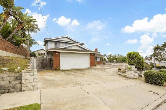 1113 Camino Del Sol Cir, Carlsbad, CA 92008 - view of front of home with brick siding, driveway, and a chimney