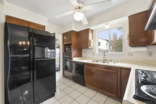 1113 Camino Del Sol Cir, Carlsbad, CA 92008 - kitchen featuring black appliances, light countertops, ceiling fan, and wall chimney range hood