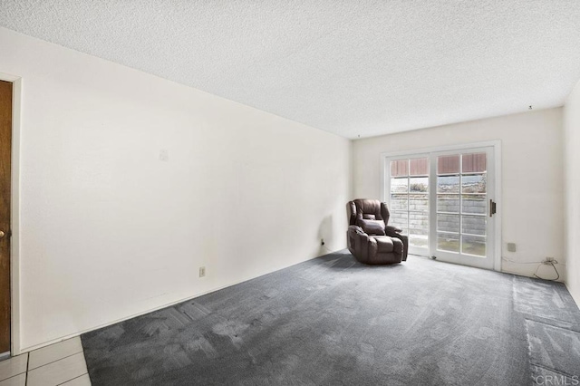 1113 Camino Del Sol Cir, Carlsbad, CA 92008 - unfurnished room featuring a textured ceiling and carpet flooring
