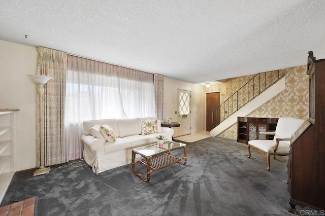 1113 Camino Del Sol Cir, Carlsbad, CA 92008 - carpeted living room with a textured ceiling, stairs, and wallpapered walls