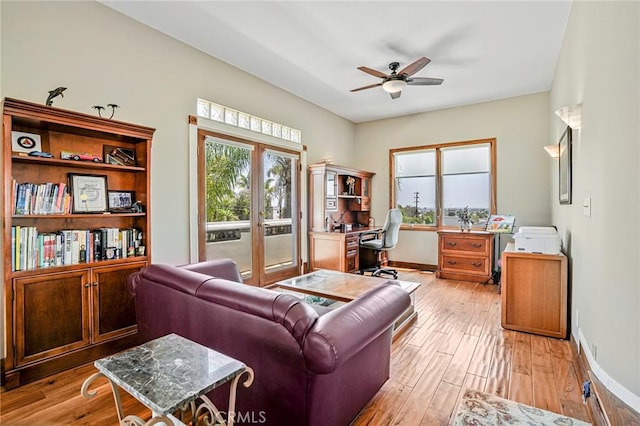 1440 8th St, Manhattan Beach, CA 90266 - living room featuring healthy amount of natural light, ceiling fan, an office area, and light wood-type flooring
