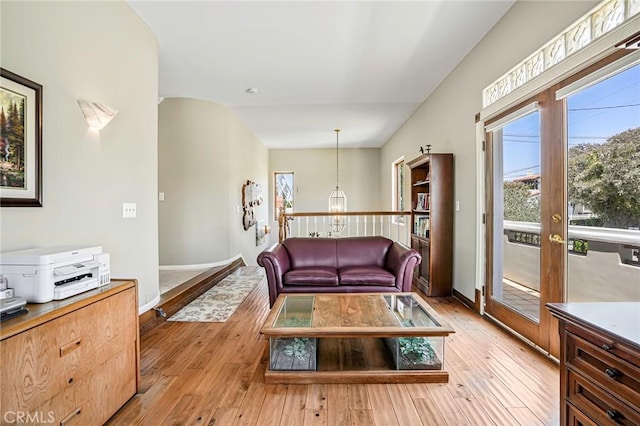 1440 8th St, Manhattan Beach, CA 90266 - living area with light wood-style floors and lofted ceiling