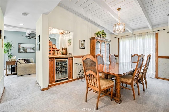1440 8th St, Manhattan Beach, CA 90266 - dining space featuring beverage cooler, light colored carpet, a chandelier, a ceiling fan, and a wooden ceiling with exposed beams