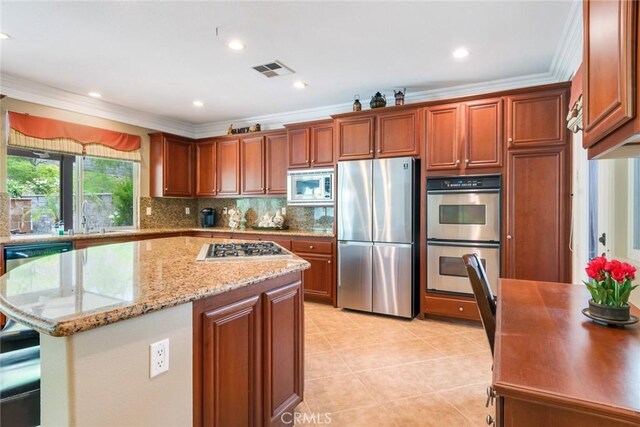 3820 Bidwell Dr, Yorba Linda, CA 92886 - kitchen with stainless steel appliances, ornamental molding, a center island, decorative backsplash, and brown cabinets