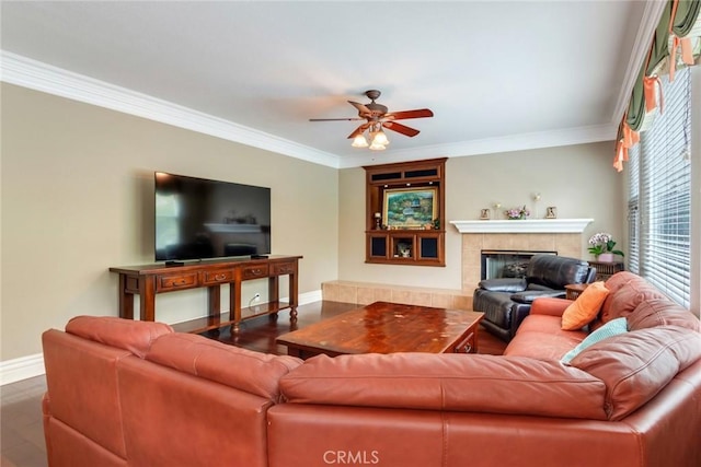 3820 Bidwell Dr, Yorba Linda, CA 92886 - living room featuring crown molding, a tiled fireplace, and ceiling fan