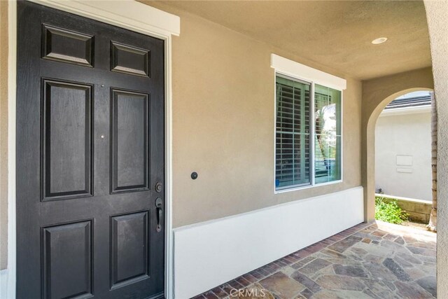 3820 Bidwell Dr, Yorba Linda, CA 92886 - doorway to property featuring stucco siding