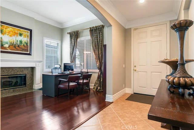 3820 Bidwell Dr, Yorba Linda, CA 92886 - foyer entrance featuring arched walkways, light wood finished floors, a high end fireplace, recessed lighting, and ornamental molding