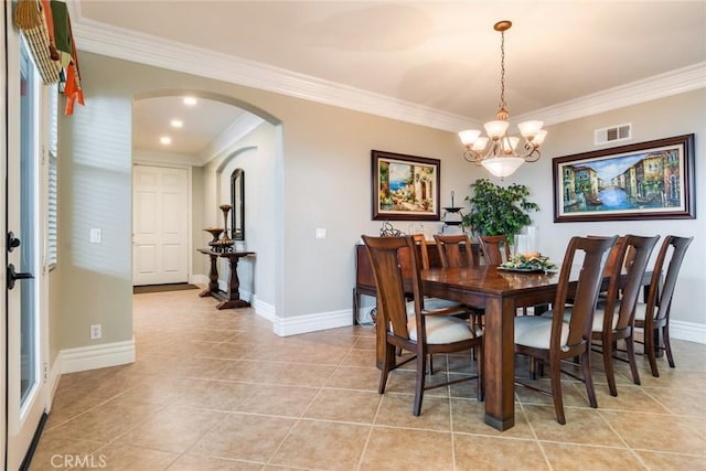 3820 Bidwell Dr, Yorba Linda, CA 92886 - dining room featuring arched walkways, a chandelier, ornamental molding, and light tile patterned floors