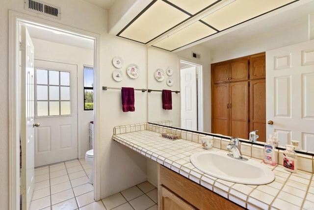 2221 Cortina Cir, Escondido, CA 92029 - bathroom featuring tile patterned floors and vanity