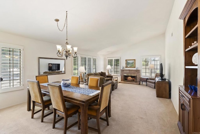 2221 Cortina Cir, Escondido, CA 92029 - dining space with light carpet, a chandelier, plenty of natural light, and lofted ceiling