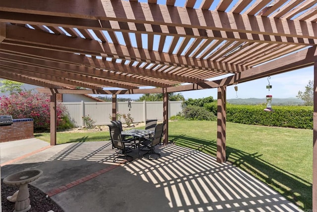2221 Cortina Cir, Escondido, CA 92029 - fenced backyard with outdoor dining area, a pergola, and a patio