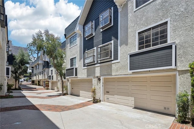 434 S Los Robles Ave Unit 4, Pasadena, CA 91101 - view of property with a garage, driveway, and a residential view
