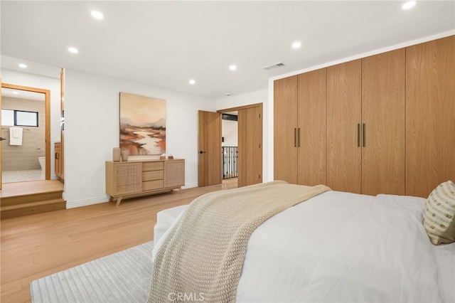 4016 Old Topanga Canyon Rd, Calabasas, CA 91302 - bedroom with recessed lighting, light wood-style floors, and connected bathroom