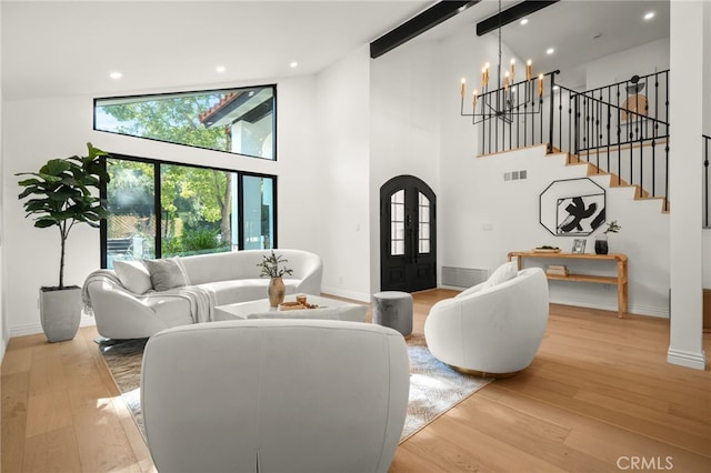 4016 Old Topanga Canyon Rd, Calabasas, CA 91302 - living room with high vaulted ceiling, light wood finished floors, stairway, recessed lighting, and beam ceiling