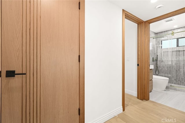 4016 Old Topanga Canyon Rd, Calabasas, CA 91302 - hall featuring wood finished floors and baseboards