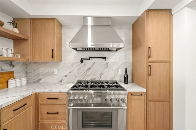 4016 Old Topanga Canyon Rd, Calabasas, CA 91302 - kitchen featuring stainless steel stove, extractor fan, open shelves, backsplash, and light stone counters
