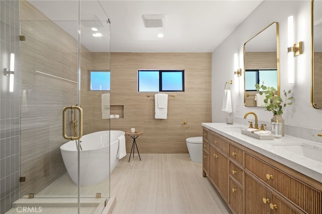 4016 Old Topanga Canyon Rd, Calabasas, CA 91302 - full bath featuring tile walls, a freestanding tub, double vanity, and a stall shower