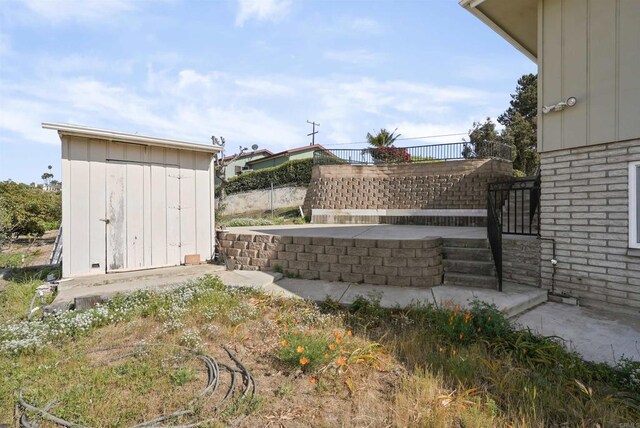 5884 Redondo Dr, Bonsall, CA 92003 - view of yard featuring a shed