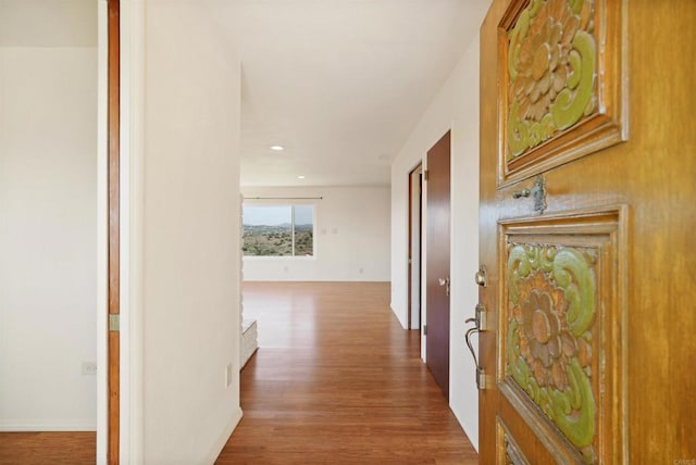 5884 Redondo Dr, Bonsall, CA 92003 - hallway featuring wood finished floors and recessed lighting