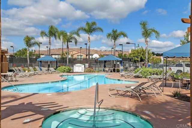 12737 Savannah Creek Dr Unit 280, San Diego, CA 92128 - community pool featuring a patio area and a community hot tub