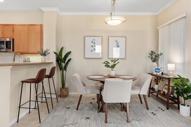12737 Savannah Creek Dr Unit 280, San Diego, CA 92128 - dining space featuring crown molding and baseboards