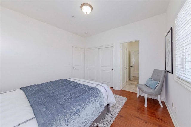 8647 Belmont St, Cypress, CA 90630 - bedroom featuring wood finished floors and a closet