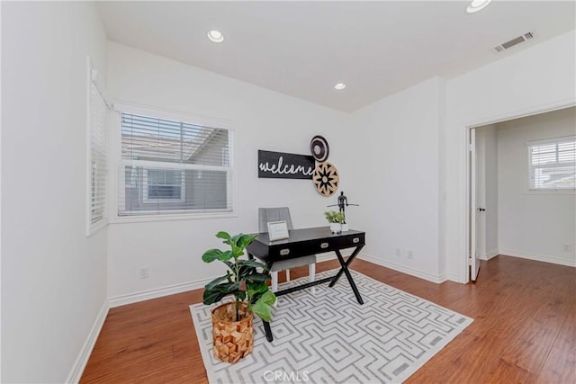 8647 Belmont St, Cypress, CA 90630 - office featuring wood finished floors and recessed lighting